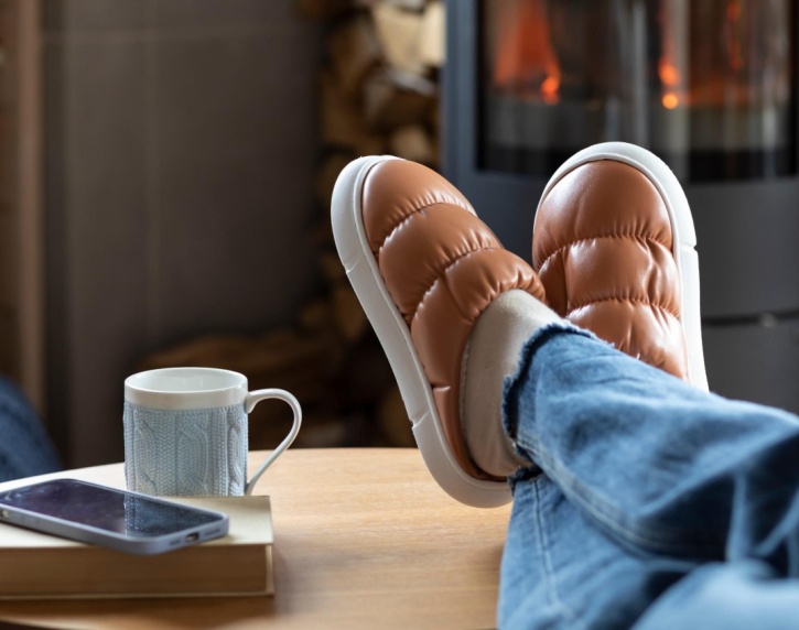 A person sitting with their feet up.