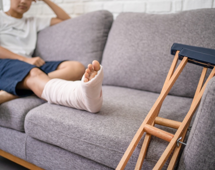 A person with a cast on their leg.